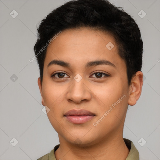 Joyful latino young-adult female with short  brown hair and brown eyes