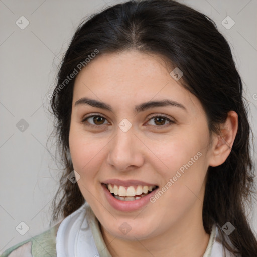 Joyful white young-adult female with medium  brown hair and brown eyes