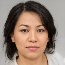 Neutral asian young-adult female with medium  brown hair and brown eyes