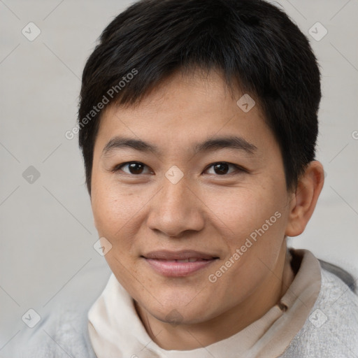 Joyful asian young-adult male with short  brown hair and brown eyes