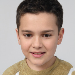 Joyful white child male with short  brown hair and brown eyes