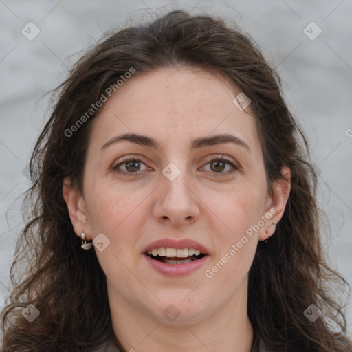 Joyful white adult female with long  brown hair and grey eyes