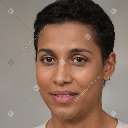 Joyful latino young-adult female with short  brown hair and brown eyes