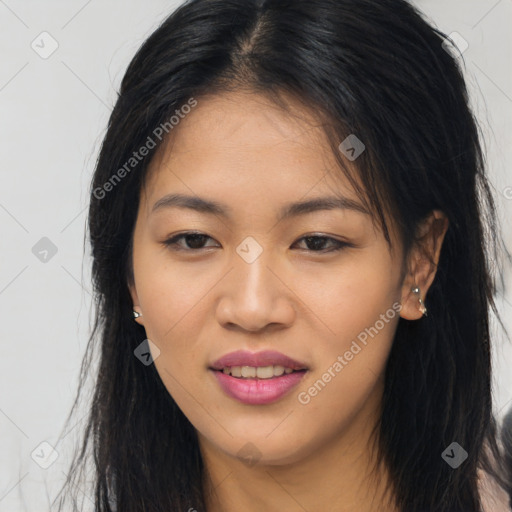 Joyful asian young-adult female with long  brown hair and brown eyes