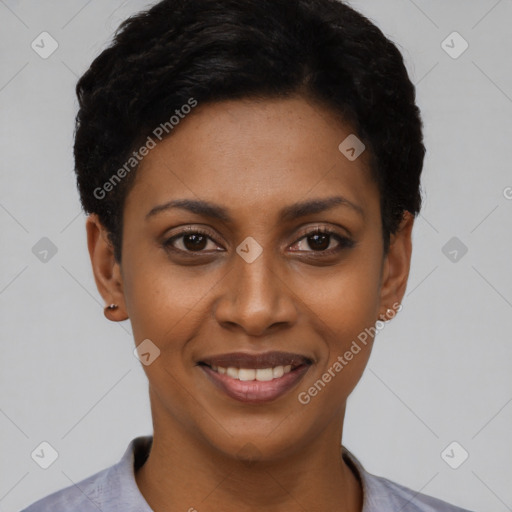 Joyful black young-adult female with short  black hair and brown eyes