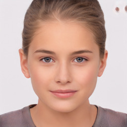 Joyful white child female with short  brown hair and brown eyes