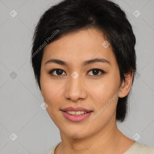 Joyful asian young-adult female with short  brown hair and brown eyes