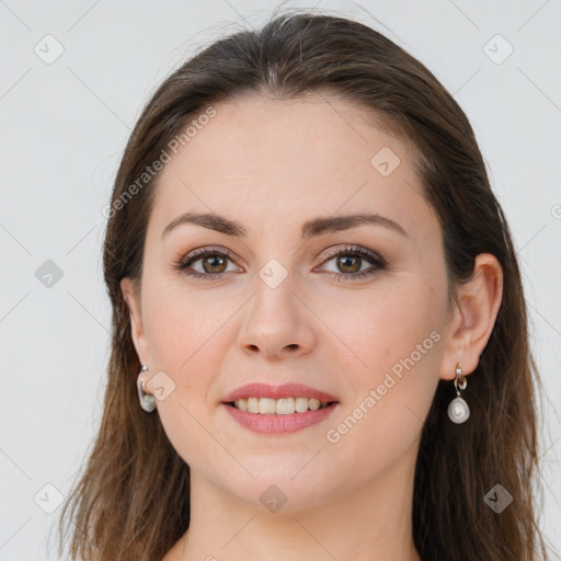 Joyful white young-adult female with long  brown hair and brown eyes