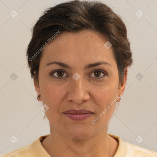 Joyful white adult female with short  brown hair and brown eyes