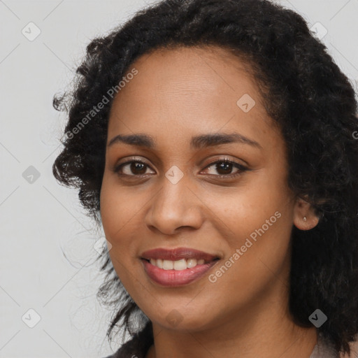 Joyful latino young-adult female with long  black hair and brown eyes