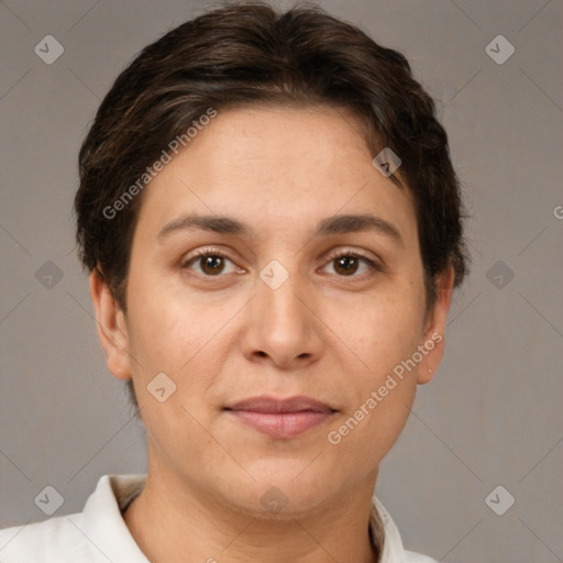 Joyful white adult female with short  brown hair and brown eyes