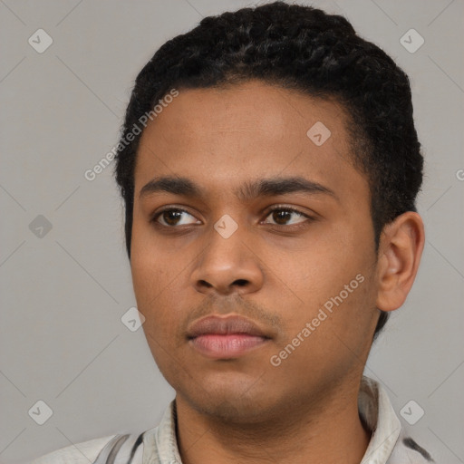 Neutral black young-adult male with short  black hair and brown eyes