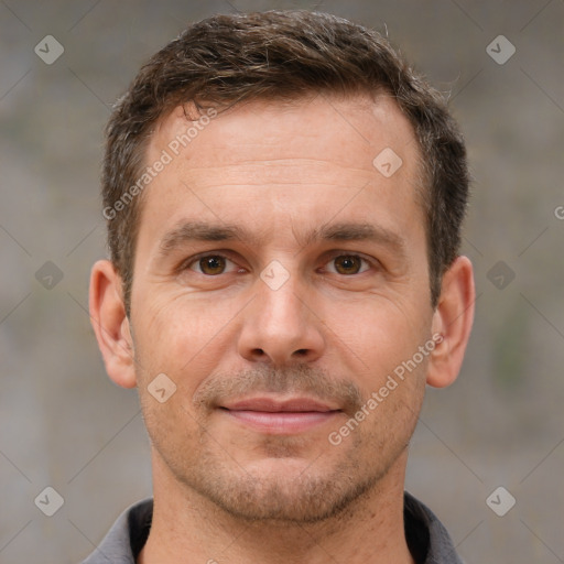 Joyful white adult male with short  brown hair and brown eyes