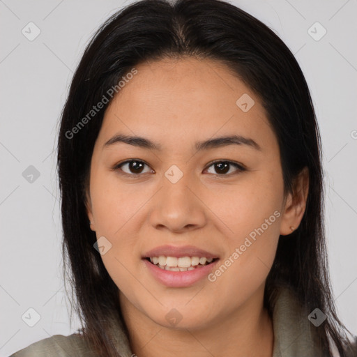 Joyful asian young-adult female with long  brown hair and brown eyes