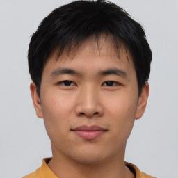 Neutral asian young-adult male with short  brown hair and brown eyes