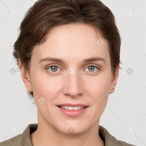 Joyful white young-adult female with short  brown hair and grey eyes