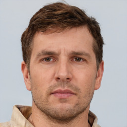 Neutral white adult male with short  brown hair and brown eyes