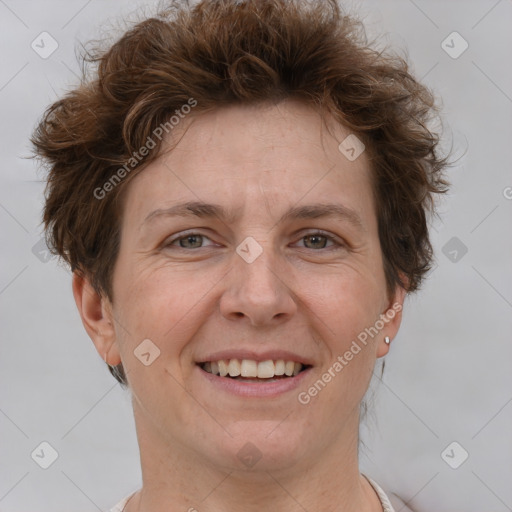 Joyful white adult female with short  brown hair and brown eyes