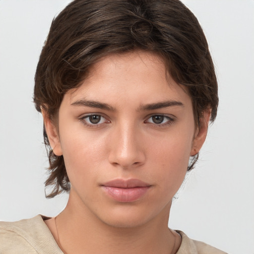 Neutral white young-adult female with medium  brown hair and brown eyes