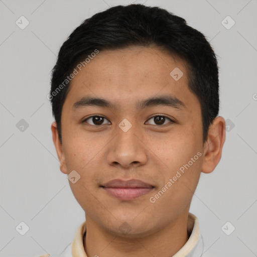 Joyful asian young-adult male with short  brown hair and brown eyes