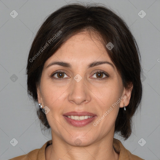 Joyful white adult female with medium  brown hair and brown eyes