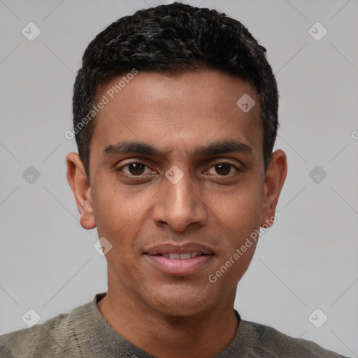 Joyful latino young-adult male with short  black hair and brown eyes