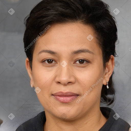 Joyful white adult female with medium  brown hair and brown eyes