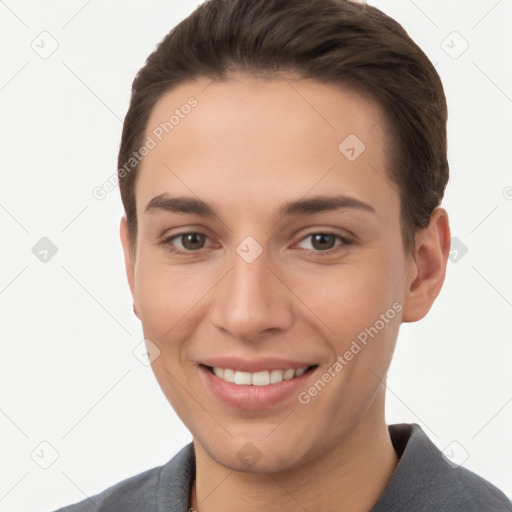 Joyful white young-adult female with short  brown hair and brown eyes