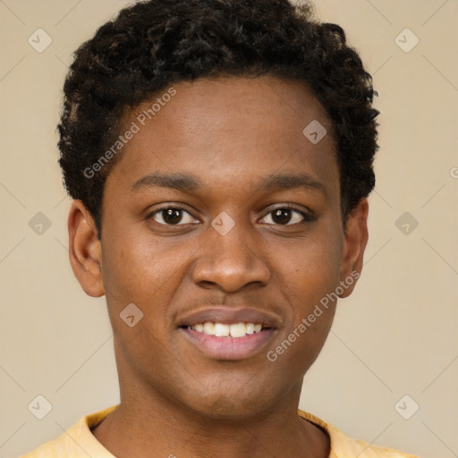 Joyful black young-adult male with short  brown hair and brown eyes