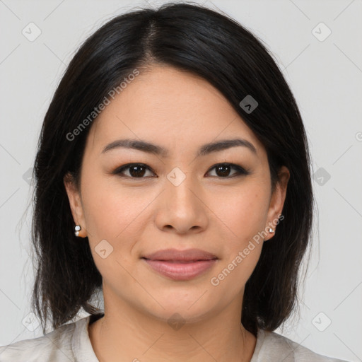 Joyful asian young-adult female with medium  black hair and brown eyes