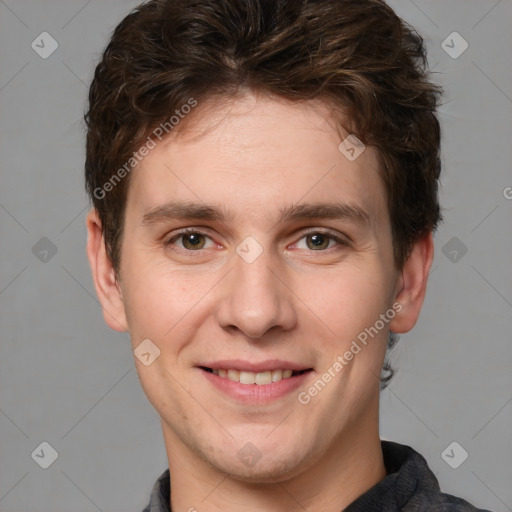 Joyful white adult male with short  brown hair and grey eyes