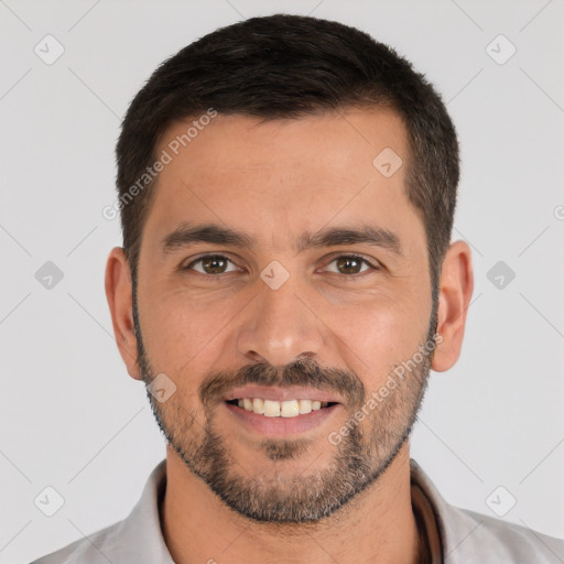 Joyful white young-adult male with short  black hair and brown eyes