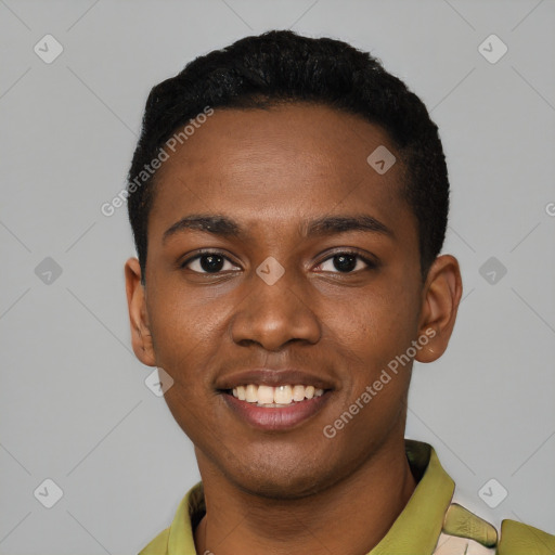 Joyful black young-adult male with short  black hair and brown eyes