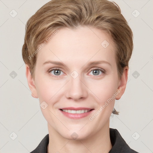 Joyful white young-adult female with short  brown hair and grey eyes