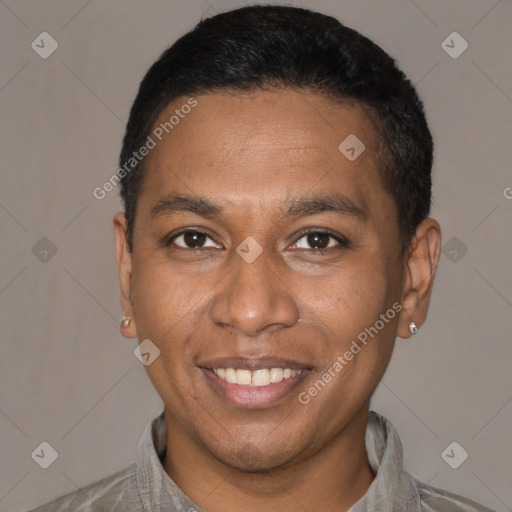 Joyful latino adult male with short  black hair and brown eyes