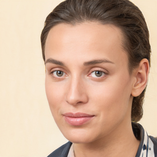 Neutral white young-adult female with medium  brown hair and brown eyes