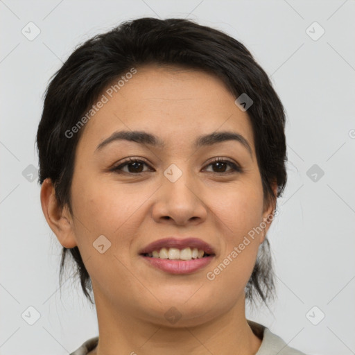 Joyful asian young-adult female with short  brown hair and brown eyes