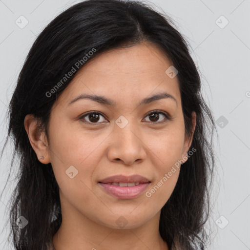 Joyful latino young-adult female with long  brown hair and brown eyes