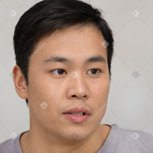 Neutral white young-adult male with short  black hair and brown eyes