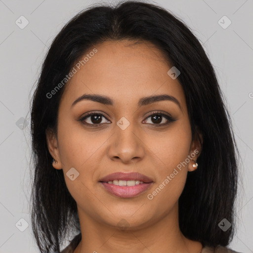 Joyful latino young-adult female with long  brown hair and brown eyes