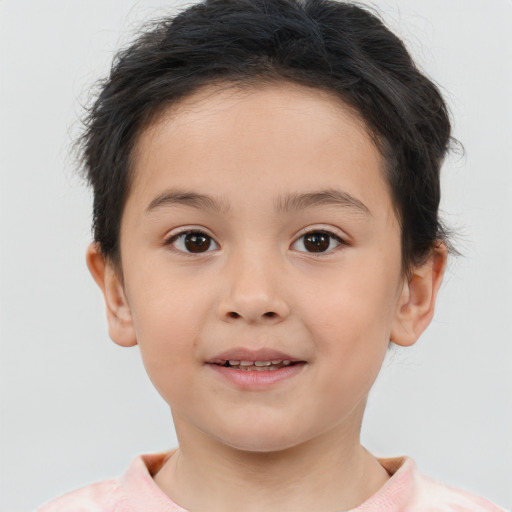 Joyful white child female with short  brown hair and brown eyes