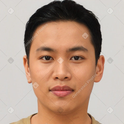 Joyful asian young-adult male with short  black hair and brown eyes