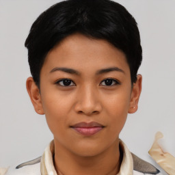 Joyful asian young-adult female with short  black hair and brown eyes