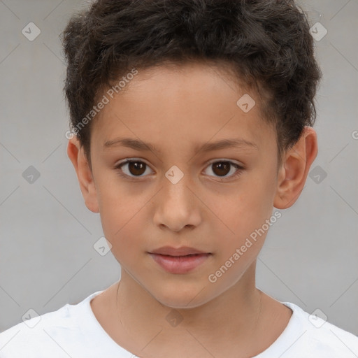 Joyful white child male with short  brown hair and brown eyes