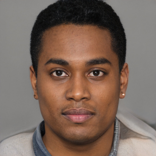 Neutral black young-adult male with short  black hair and brown eyes