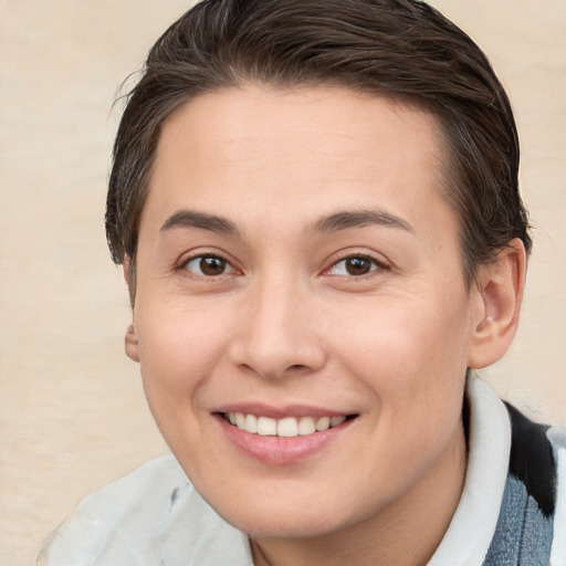 Joyful white young-adult female with short  brown hair and brown eyes