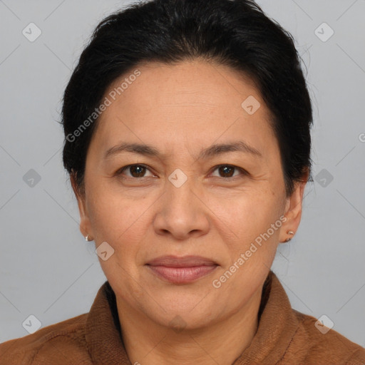 Joyful white adult female with short  brown hair and brown eyes