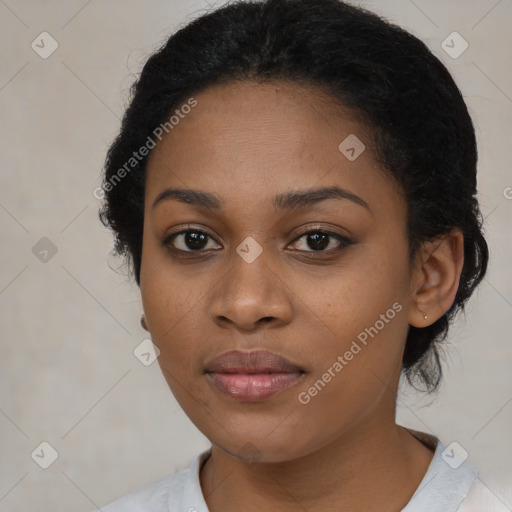 Joyful black young-adult female with medium  black hair and brown eyes