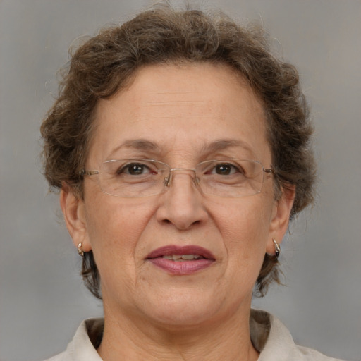 Joyful white middle-aged female with short  brown hair and brown eyes