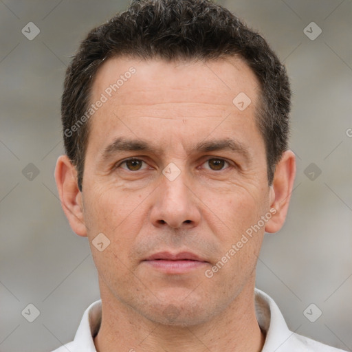 Neutral white adult male with short  brown hair and brown eyes